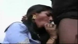 Indian babe giving foot blow job