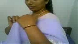 Beautiful Indian in white saree blows
